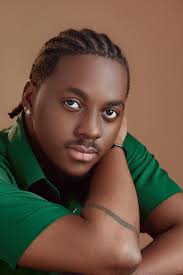 PETER KOMBA
